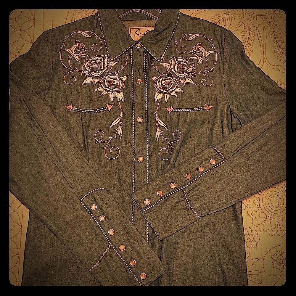 Western denim, pearl snap shirt.